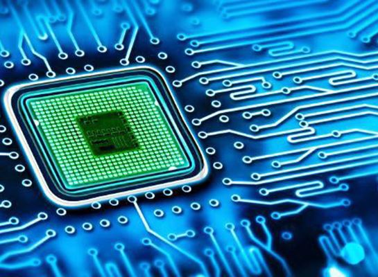 green chip on blue circuitboard