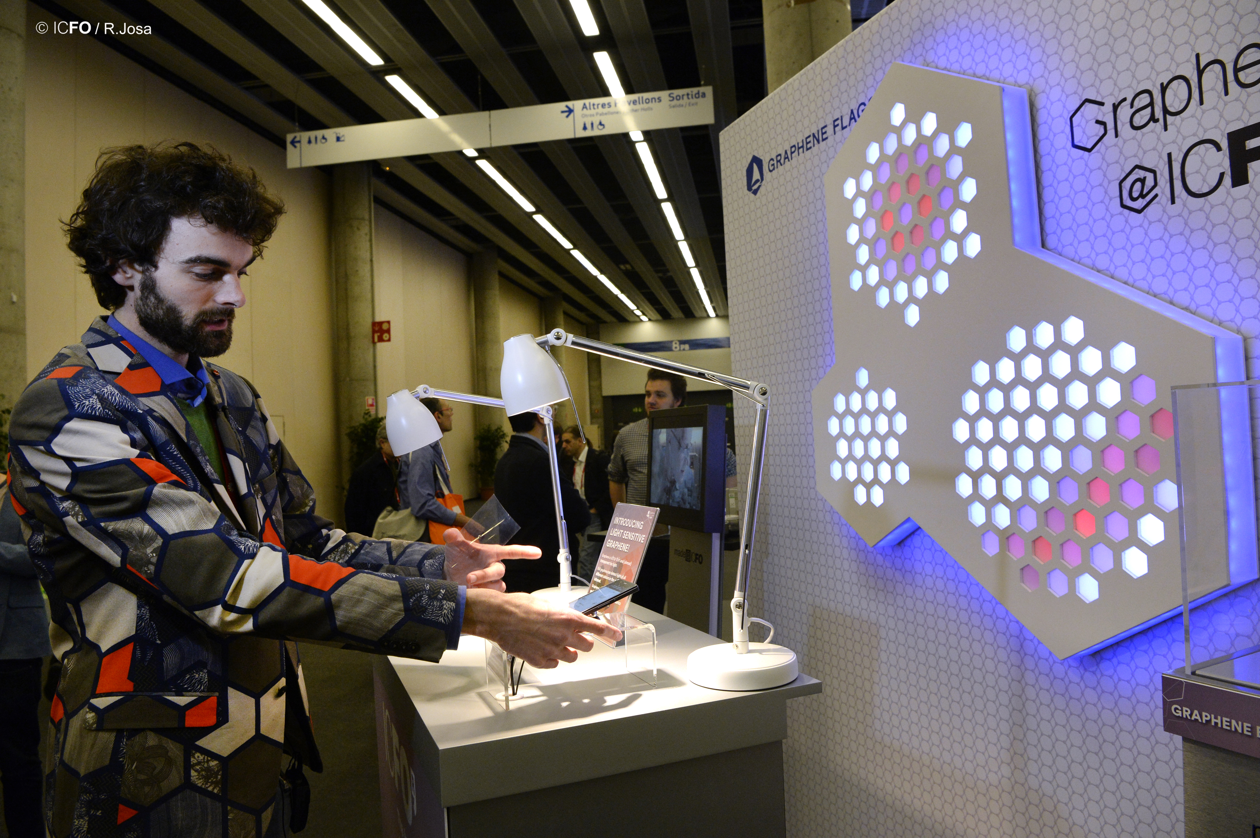Researcher explaining graphene