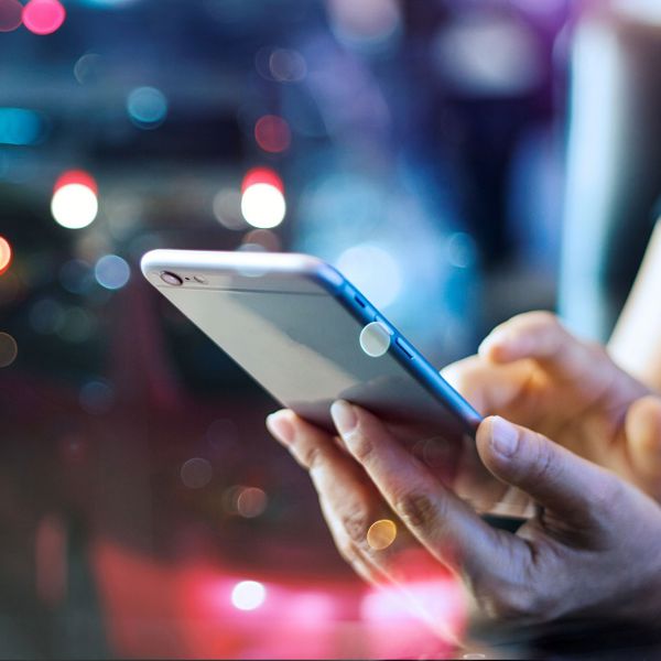 Women holding a cellphone.