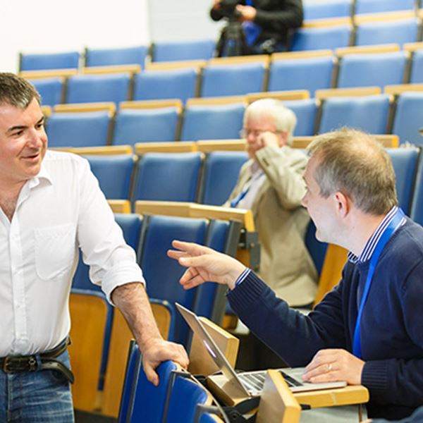 Konstantin novoselov talking to colleagues