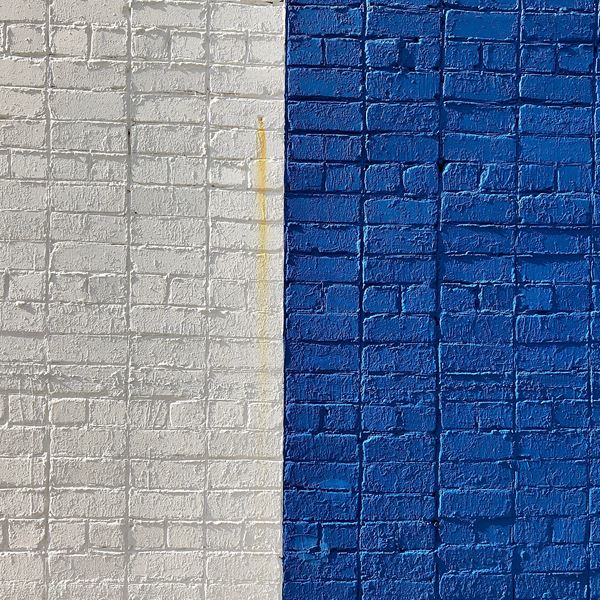 Bricka wall painted in beige and blue