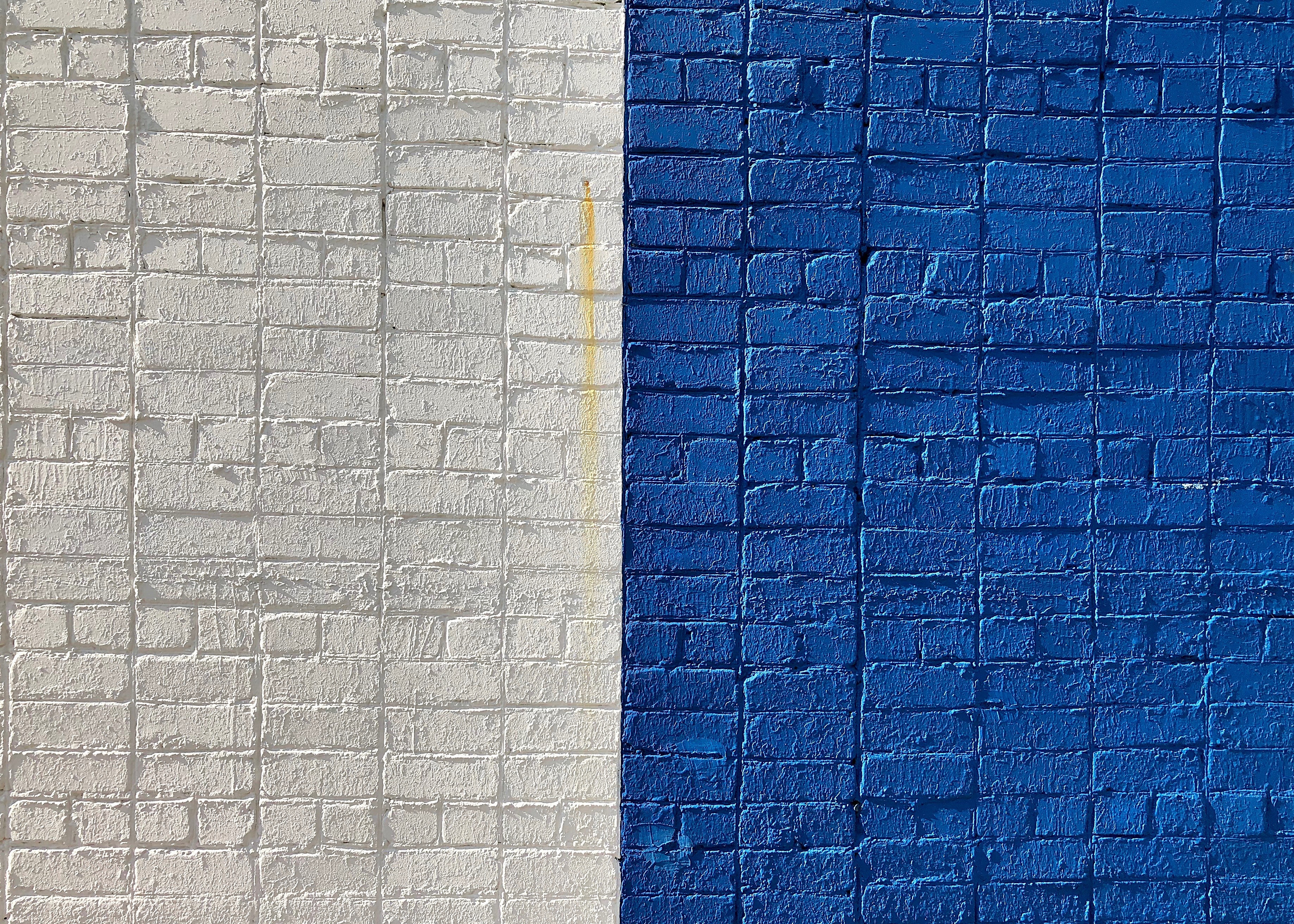 Bricka wall painted in beige and blue