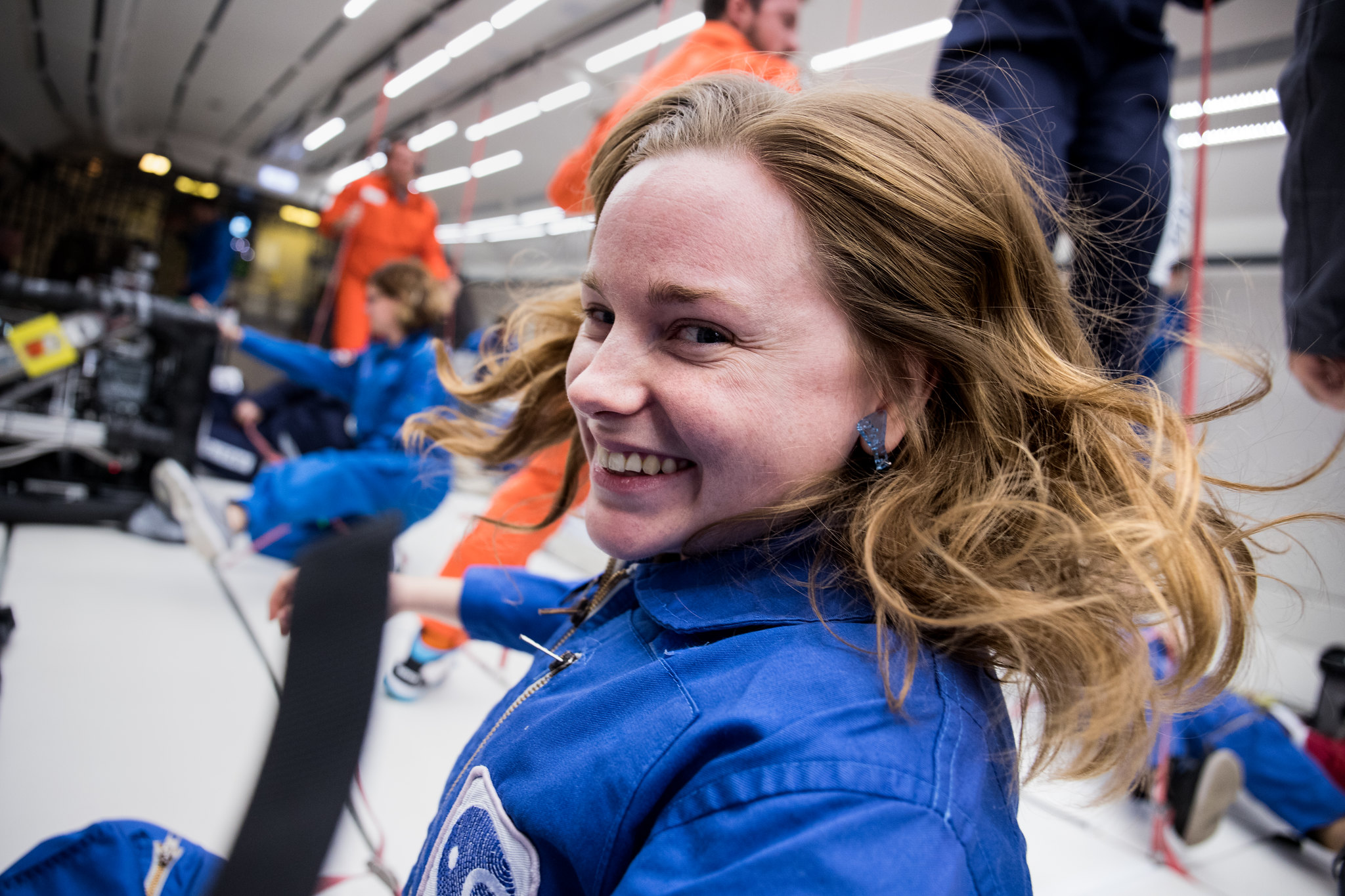  Female researcher onboard a zero-gravity parabolic flight.