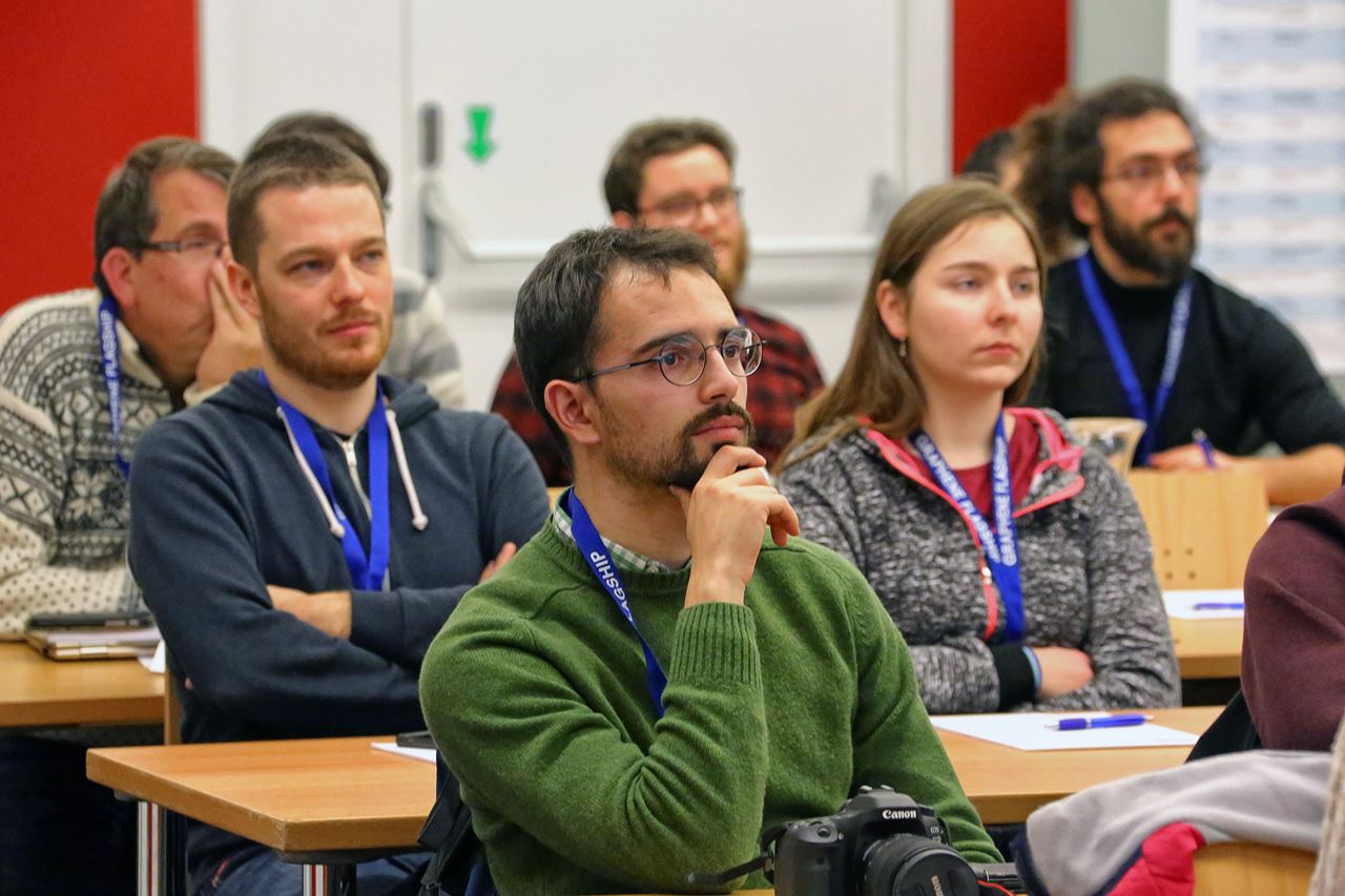 Early career researchers attend a lecture at the Graphene Study winter school.
