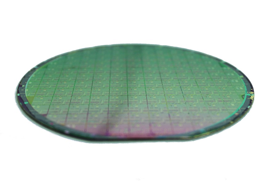 Photograph of a wafer with silicon photonic circuits and graphene photodetectors