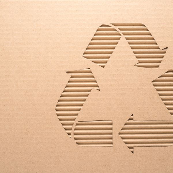 Beige recycle symbol on beige background 