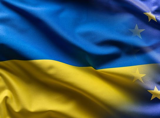 Ukrainian flag fading into EU flag